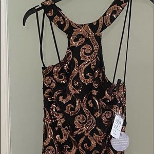 Stunning black and rose sequenced mermaid dress.